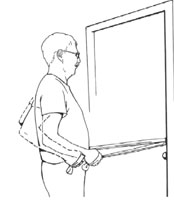 Man pulling back on a resistance band anchored in a door frame as part of a strength training routine. This is called resistance band rowing.